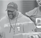  ?? CAITIE MCMEKIN/NEWS SENTINEL ?? Jimmy Brumbaugh, co-defensive coordinato­r/defensive line coach, coaches players in drills during Tennessee Vols football practice at University of Tennessee on March 10.