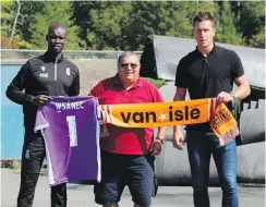  ?? PACIFIC FC ?? From left, Pacific FC head coach Pa-Modou Kah, WSÁNEû School Board administra­tor Curtis Olsen and Pacific FC CEO Rob Friend show off a team shirt and scarf.