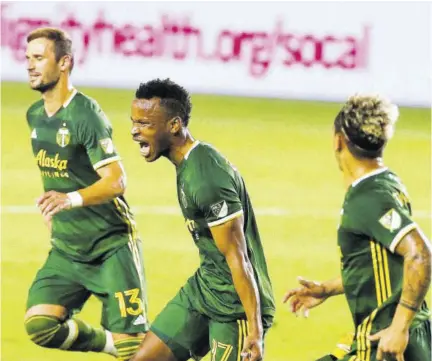  ?? (Photo: AP) ?? Portland Timbers forward Jeremy Ebobisse (centre) celebrates after scoring a goal against the LA Galaxy during the first half of an MLS soccer match in Carson, California, last Wednesday.