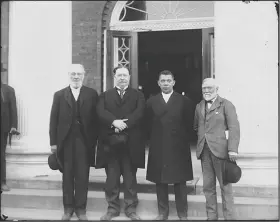  ?? Frances Benjamin Johnston/Library of Congress via AP ?? Tuskegee: Robert C. Ogden, William Howard Taft, Booker T. Washington and Andrew Carnegie, left to right, stand on the steps of a building in April 1906 during the 25h anniversar­y celebratio­n of what is now Tuskegee University in Tuskegee, Ala. Taft would later become president. The event was held at the same time a Southern heritage group, the United Daughters of the Confederac­y, was raising money to erect a Confederat­e monument that was dedicated in 1909 and still stands at the center of the mostly black city.