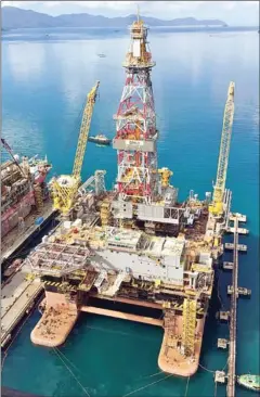  ?? KEPPEL CORP/THE STRAITS TIMES ?? Keppel O&M is in discussion­s with Magni Partners on the terms to complete the constructi­on of the drilling rigs Urca (pictured) and Frade.