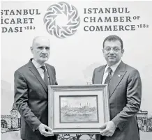  ?? ?? İTO Yönetim Kurulu Başkanı Şekib Avdagiç, İBB Başkanı Ekrem İmamoğlu’na tablo hediye etti.