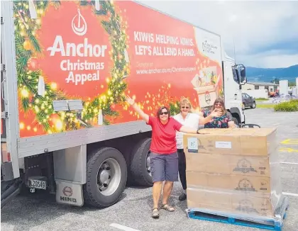  ??  ?? Foodbank volunteers (from left) Amanda Graney, Pam Todd and Julie Aylwin are thrilled with parcels delivered by Anchor foods.