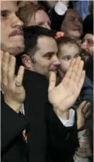  ??  ?? Mulcair kisses his wife, Catherine Pinhas, after winning the NDP leadership at a 2012 convention.