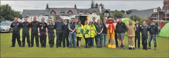  ?? 01_B11emergen­cy02 ?? Arran’s emergency service’s retained and volunteer staff pictured at a blue light event at Sandbraes last year.