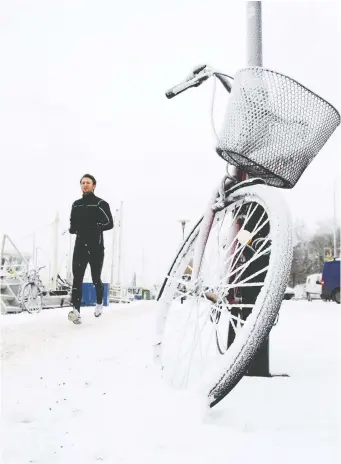  ?? JONATHAN NACKSTRaND/AFP/GETTY IMAGES ?? It takes some planning to get ready for a winter workout.