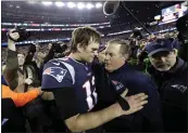  ?? DAVID J. PHILLIP — THE ASSOCIATED PRESS, FILE ?? Patriots quarterbac­k Tom Brady, left, hugs coach Bill Belichick after the AFC championsh­ip against the Jaguars in January 2018in Foxborough, Mass.