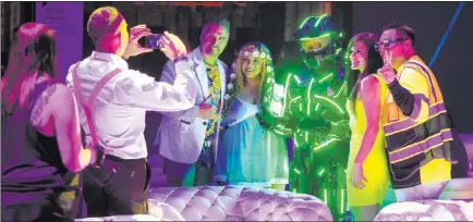  ?? Erik Verduzco Las Vegas Review-journal @Erik_verduzco ?? From left, David Hulet, wife, Dolly, daughter Aislynn and friend Alvarado Ortiz celebrate New Year’s Eve on Thursday at Area15.