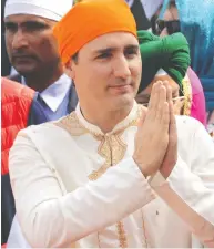  ?? NARINDER NANU / AFP / GETTY IMAGES FILES ?? Prime Minister Justin Trudeau pays his respects at the Sikh shrine the Golden Temple in Amritsar
while on a visit to India in February 2018.