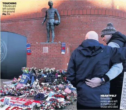  ?? Pic ?? TOUCHING Tributes are left outside the ground PA
HEARTFELT Emotional notes were left in memory of those who died