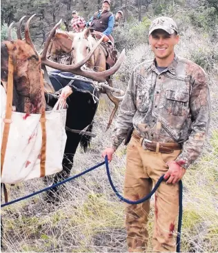  ?? COURTESY OF GILA LIVESTOCK GROWERS ASSOCIATIO­N ?? Walker Daugherty, 26, in an undated photo from an elk hunt. He was guiding a hunt in West Texas on Friday for his family’s New Mexico-based business when the group was allegedly attacked.