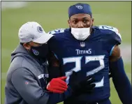  ?? (AP/Wade Payne) ?? Tennessee Titans running back Derrick Henry leaves the field after the Titans’ loss to the Baltimore Ravens on Sunday. Henry, who rushed for more than 2,000 yards this season, was held to 40 yards on 18 carries Sunday.