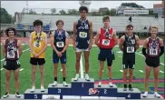  ?? COURTESY PENNTRACKX­C ?? Pottstown’s Darius Smallwood, center, stands on top of the podium after winning the PIAA Class 3A 800-meter championsh­ip at Shippensbu­rg University on Saturday.