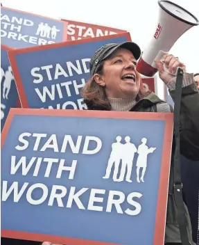  ??  ?? Activists rally outside the Supreme Court as it debated. ALEX WONG/GETTY IMAGES