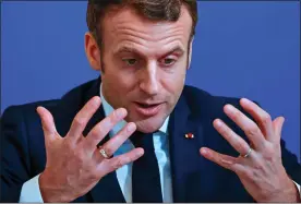  ??  ?? ON THE BACK FOOT: Emmanuel Macron pledged better access to the jab