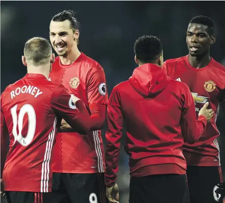  ?? — GETTY IMAGES FILES ?? High-profile signings Zlatan Ibrahimovi­c (second from left) and Paul Pogba (far right) are firing on all cylinders with Manchester United riding a nine-game winning streak.