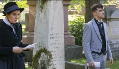  ?? (Democrat-Gazette file photo) ?? Parkview High students Bailey Bradford (left) and Rafe Hall rehearse their portrayals of Senhora Dodd Booth and her brother, David O. Dodd, at Dodd’s grave for the 2018 “Tales of the Crypt” at Mount Holly Cemetery.