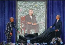  ?? MARK WILSON / GETTY IMAGES ?? Former President Barack Obama and artist Kehinde Wiley unveil his portrait during a ceremony Feb. 12 at the Smithsonia­n’s National Portrait Gallery in Washington.