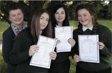  ??  ?? Leah Bools, deputy principal at St Kilian’s, with Alannah Maher, Naoise O’Connell and Kayleigh Howick.