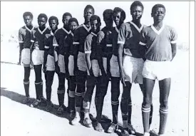  ?? ?? The sniffer…Kastamba (8th from left), attired in the gold and grass strip of the all-conquering Rhenisch Herero School native schools’ football champions at the old Katutura Municipal Sport stadium in 1967. Standing from left: Shaka Mbako (d+), Hofni ‘Grey’ Umati, Erastus Uazuvirua ‘Nobby Stiles’ Hambira, Matheus Kometundu Tjituka, Justus Kaika Kuzee (d+), Katjitata Kazombiaze (d+), Usiel Kastamba Hijakuroor­o ‘Kamboha’ Muruko (d+), Gustav Bollie Kandonga (d+), Fundi Kiddo Kambangula, Ephraim Kaparoro Kandjii, Johannes Kapuii ‘Black Napoleon’ Hangula (capt d+).