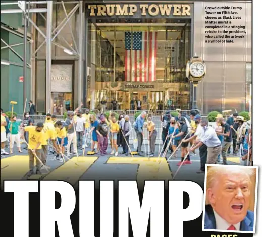  ??  ?? Crowd outside Trump Tower on Fifth Ave. cheers as Black Lives Matter mural is completed in a stinging rebuke to the president, who called the artwork a symbol of hate.