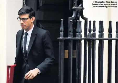  ??  ?? > Chancellor Rishi Sunak leaves after a government Cobra meeting yesterday