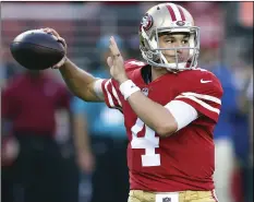  ?? AP PHOTO/BEN MARGOT ?? In this Nov. 1, file photo, San Francisco 49ers quarterbac­k Nick Mullens throws a pass against the Oakland Raiders during the first half of an NFL football game in Santa Clara.