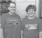  ?? COURTESY OF COREY SHELTON ?? Corey Shelton, a science teacher in Jackson, Mich., stands with his son Logan. Shelton is concerned about how a proposal to allow states to file for bankruptcy would affect his pension.