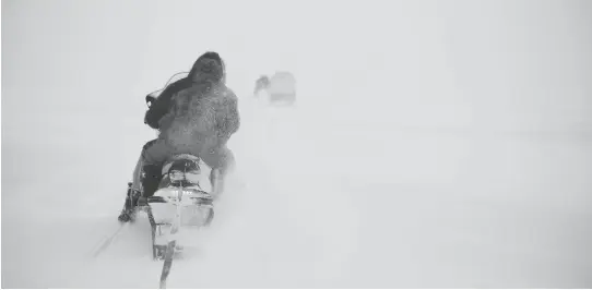  ?? PHOTOS: JONATHAN FRANTZ ?? Led by elders Michelline and Samueli, the Ammaaq family leaves Igloolik to retrieve their cache of igunaq — fermented walrus — which was carefully prepared and buried in the summer. “Igloolik has the right kind of rocks, so the meat doesn’t over-rot,”...