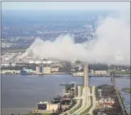  ?? THE ASSOCIATED PRESS ?? A chemical fire burns at a facility during the aftermath of Hurricane Laura Aug. 27, near Lake Charles, La.