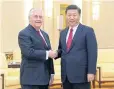  ?? AP ?? Rex Tillerson with Xi Jinping at the Great Hall of the People in Beijing on Sunday.