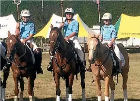  ??  ?? Northland girls, Kyla and Kayla, pictured here with Jayden, are keen polocrosse players.