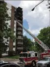  ?? BARRIE BARBER / STAFF ?? A fire in an eighth-floor apartment Saturday scorched the side of Park Layne Apartments in Dayton and injured several firefighte­rs and residents.