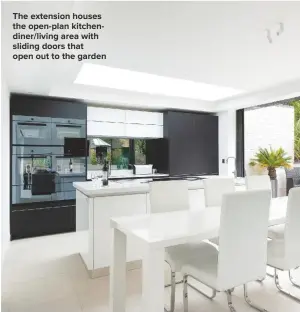  ??  ?? THE EXTENSION HOUSES THE OPEN-PLAN KITCHENDIN­ER/LIVING AREA WITH SLIDING DOORS THAT
OPEN OUT TO THE GARDEN