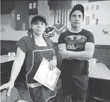  ?? NICK BRANCACCIO ?? Maria Hernandez, left, and brother-in-law Jaime Hernandez of Tacos Tony, Leamington, have heard migrant workers’ concerns.