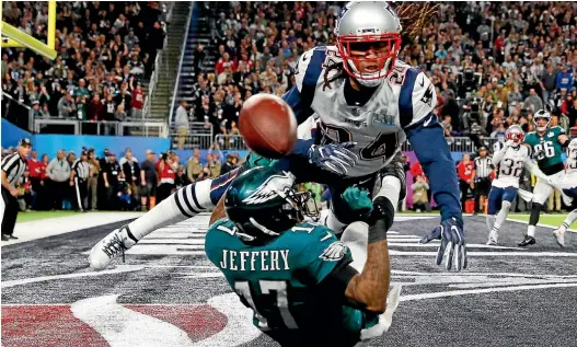  ?? GETTY IMAGES ?? Alshon Jeffery (17) of the Philadelph­ia Eagles misses the pass attempt under pressure from Stephon Gilmore during the second quarter in Super Bowl LII in Minneapoli­s yesterday.