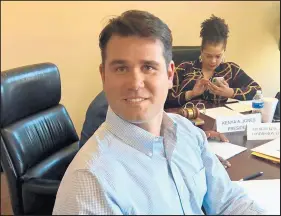  ?? GREGORY TEJEDA/POST-TRIBUNE ?? A.J. Bytnar, new executive director of the redevelopm­ent commission, helped run the May 15 meeting in Gary.