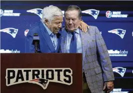  ?? STEVEN SENNE / ASSOCIATED PRESS ?? New England Patriots team owner Robert Kraft (left) and former Patriots head coach Bill Belichick embrace during a news conference, in Foxborough, Mass., on Thursday. The pair announced that Belichick, a six-time NFL champion, has agreed to part ways with the team.