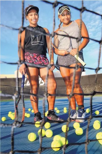  ?? JIM THOMPSON/JOURNAL ?? Sisters Carmen Corley, left, and Ivana Corley, have been working regularly with coaches at the Lobo Performanc­e Tennis Academy for several years. The competitio­n-oriented training focuses on fitness, endurance and strength. They have each won high school state titles with Eldorado High School.