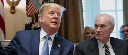  ?? The New York Times ?? President Donald Trump speaks during a July 16 meeting at the White House, while then-Navy Secretary Richard Spencer, right, listens.