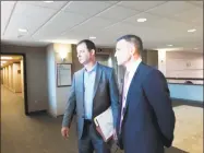  ?? Lisa Backus / Hearst Connecticu­t Media ?? Fotis Dulos, right, arrives with his attorney William Murray on Tuesday to be deposed in his motherinla­w’s civil lawsuit.