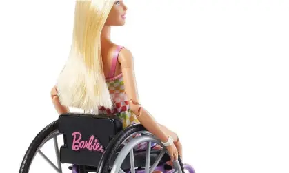  ?? ?? ‘Wheelchair Barbie. She is blonde, her long glossy hair draped down her back … ’ Photograph: Barbie