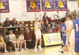  ?? Photo by Becky Polaski ?? Marcus Muccio, 23, made six threes for the Crusaders in Friday’s junior varsity crosstown rivalry matchup between ECC and SMA.