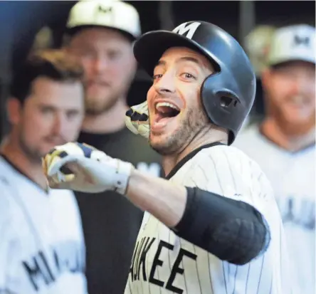  ?? ASSOCIATED PRESS ?? The Brewers’ Ryan Braun celebrates his home run during the fifth inning against the Reds on Sunday. He has 40 career homers vs. Cincinnati.