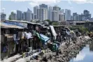  ??  ?? Duterte’s drugs war in the Manila slums is increasing­ly seen as a war on the poor. Photograph: Noel Celis/AFP/Getty Images)