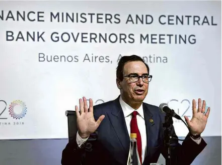  ?? Juan Mabromata/AFP ?? Steven Mnuchin, secretário do Tesouro dos Estados Unidos, durante encontro de ministros do G20, em Buenos Aires