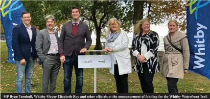  ?? ?? MP Ryan Turnbull, Whitby Mayor Elizabeth Roy and other officials at the announceme­nt of funding for the Whitby Waterfront Trail