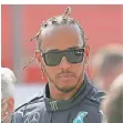  ?? FOTO: DPA ?? Äußerlich cool: Weltmeiste­r Lewis Hamilton.
