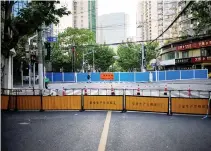  ?? REUTERS ?? A CLOSED STREET is pictured during lockdown amid the coronaviru­s disease 2019 (COVID-19) pandemic, in Shanghai, China, May 5.