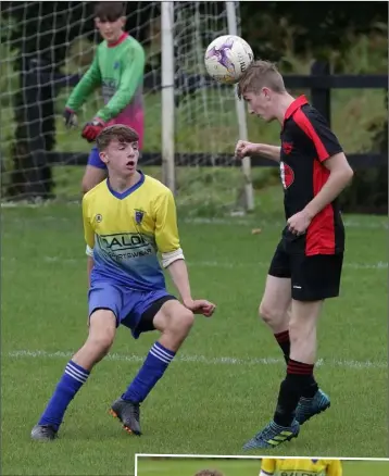  ??  ?? Darragh Malone of Bridge Rovers gets his head to the ball as Ciarán Fox of Wexford Celtic closes in. RIGHT: Lee Donohue of Wexford Celtic is chased by Wictor Yanzcy.